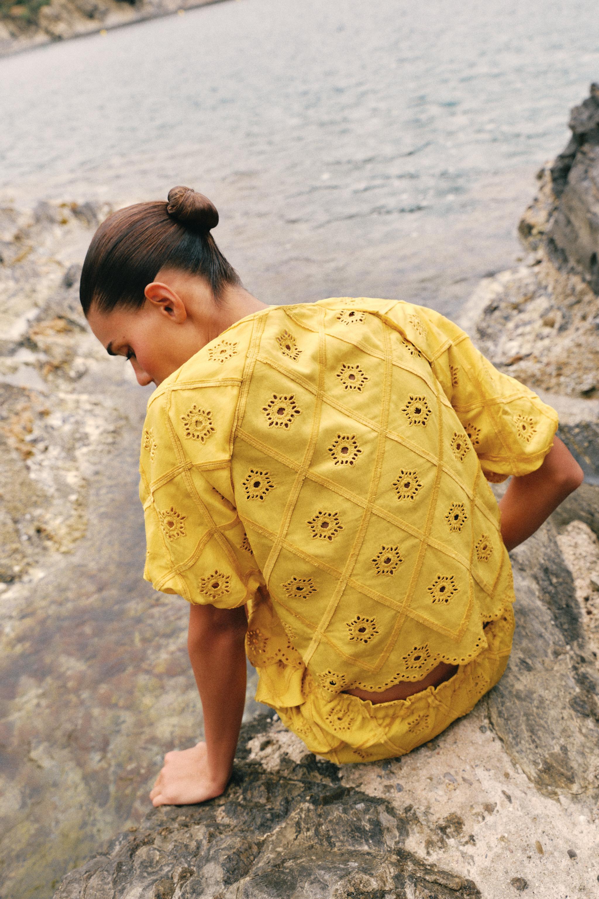 EMBROIDERED EYELET TOP